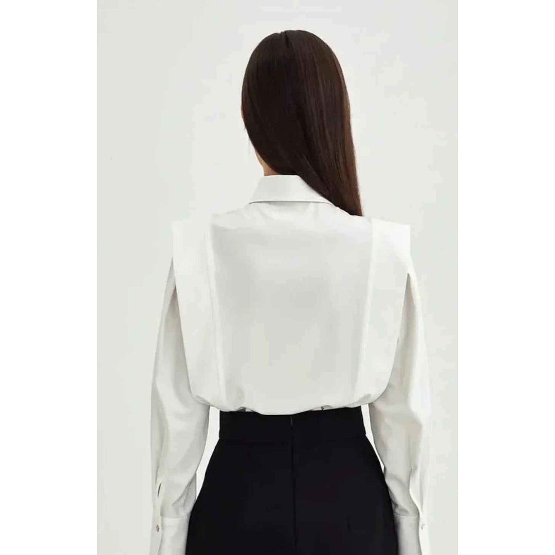 Rechte blouse voor dames met meerdere knopen