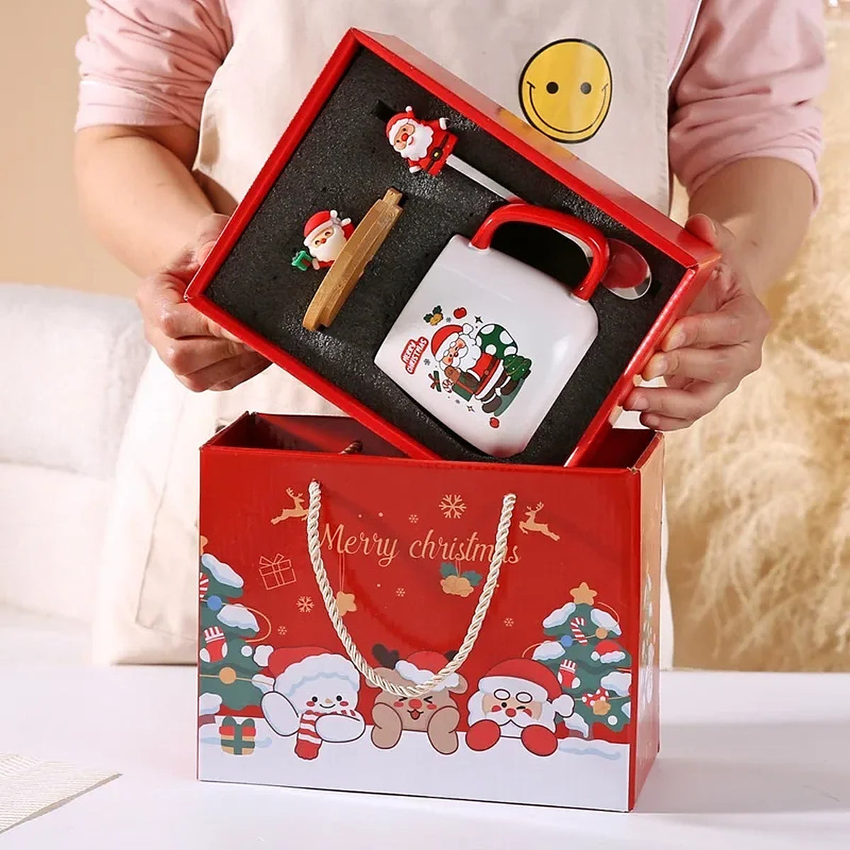 Kerstmok in cadeaudoos rood met kerstman