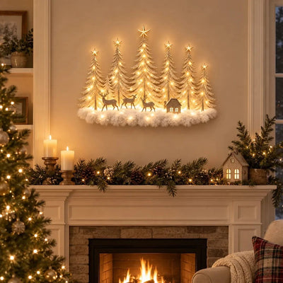 Verlichte winterbos wanddecoratie boven de open haard